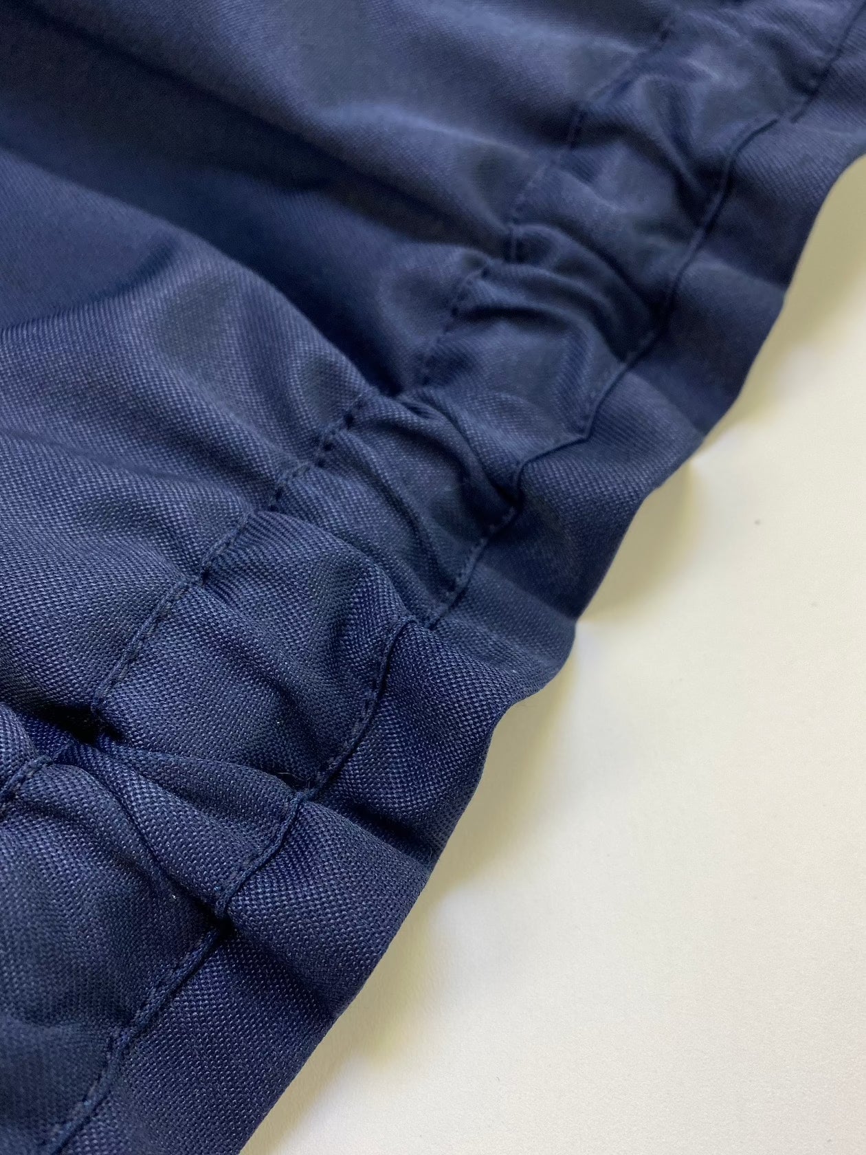 ネイビーのオーバーサイズフード付きジャケット