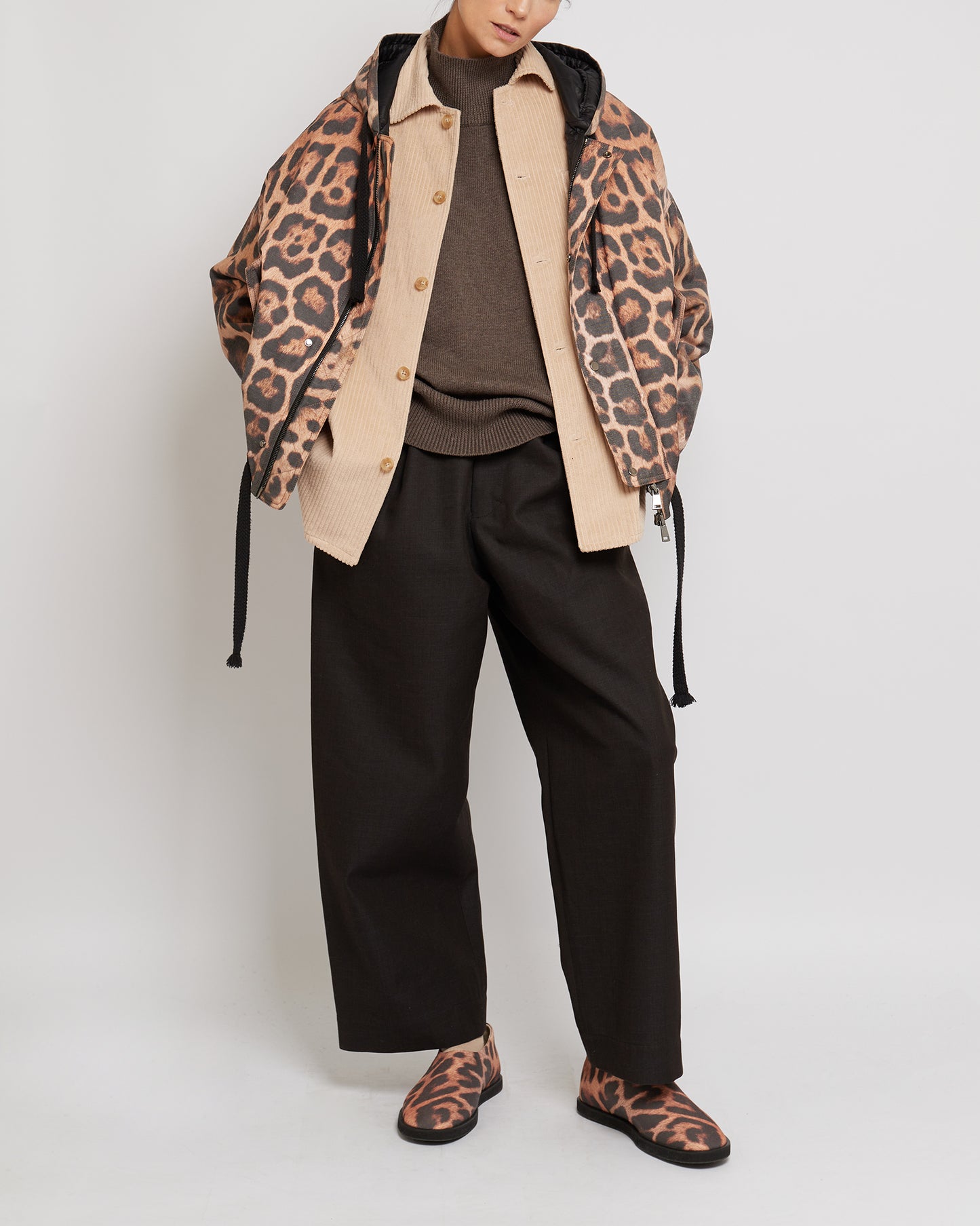 Leopard print ovresized hooded jacket worn by a model