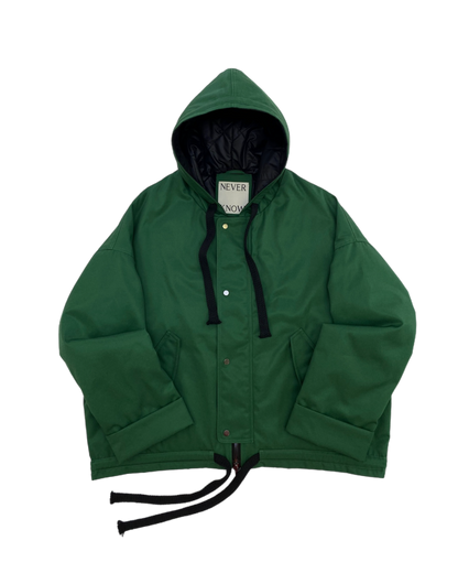 Green oversized hooded jacket with quilted lining and insulation.