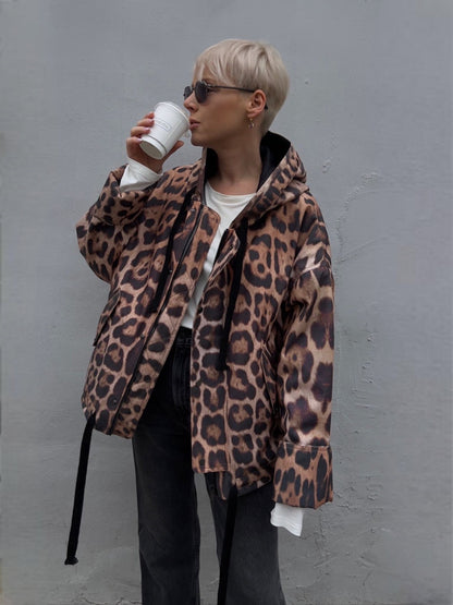 Leopard print oversized hooded jacket worn by model.