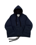 Navy oversized hooded jacket with quilted lining and insulation.