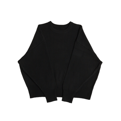 Black crew neck oversized cotton blend sweater with ribbed cuffs and hem.