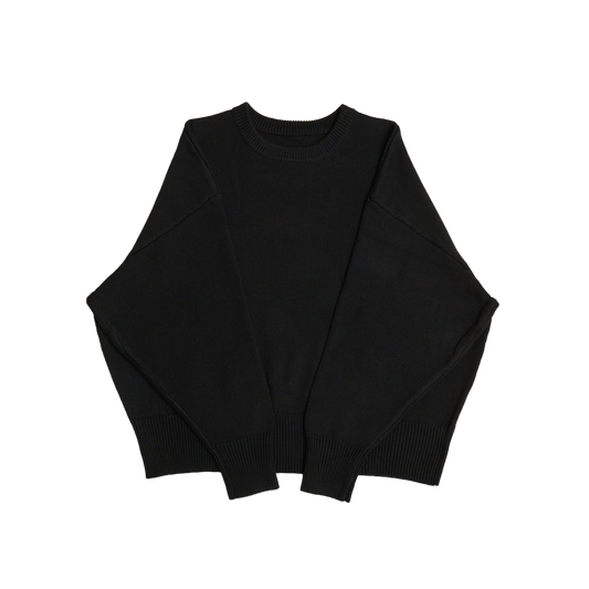 Black crew neck oversized cotton blend sweater with ribbed cuffs and hem.