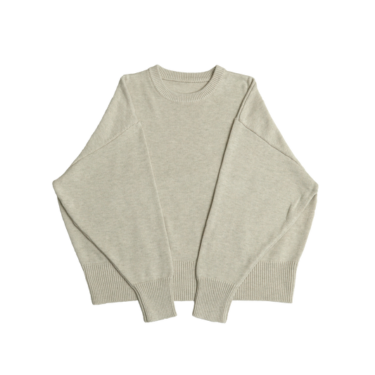 Bone white crew neck oversized cotton blend sweater with ribbed cuffs and hem.