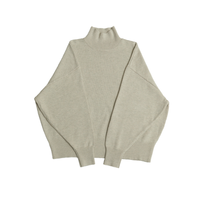 Bone white mock neck oversized cotton blend sweater with ribbed cuffs and hem.