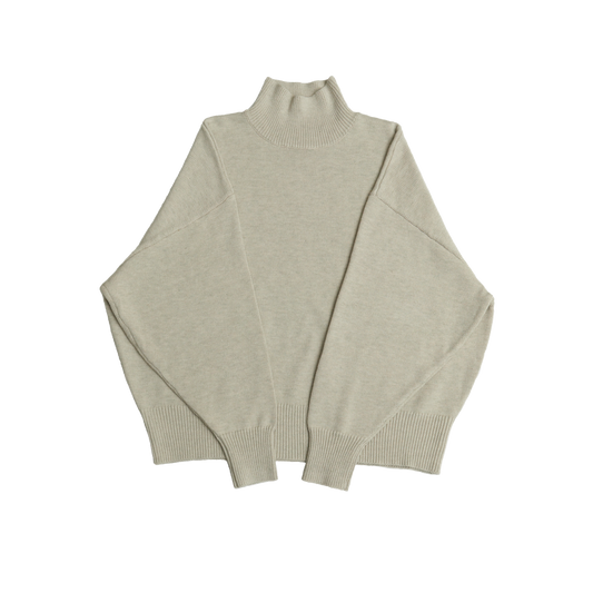 Bone white mock neck oversized cotton blend sweater with ribbed cuffs and hem.